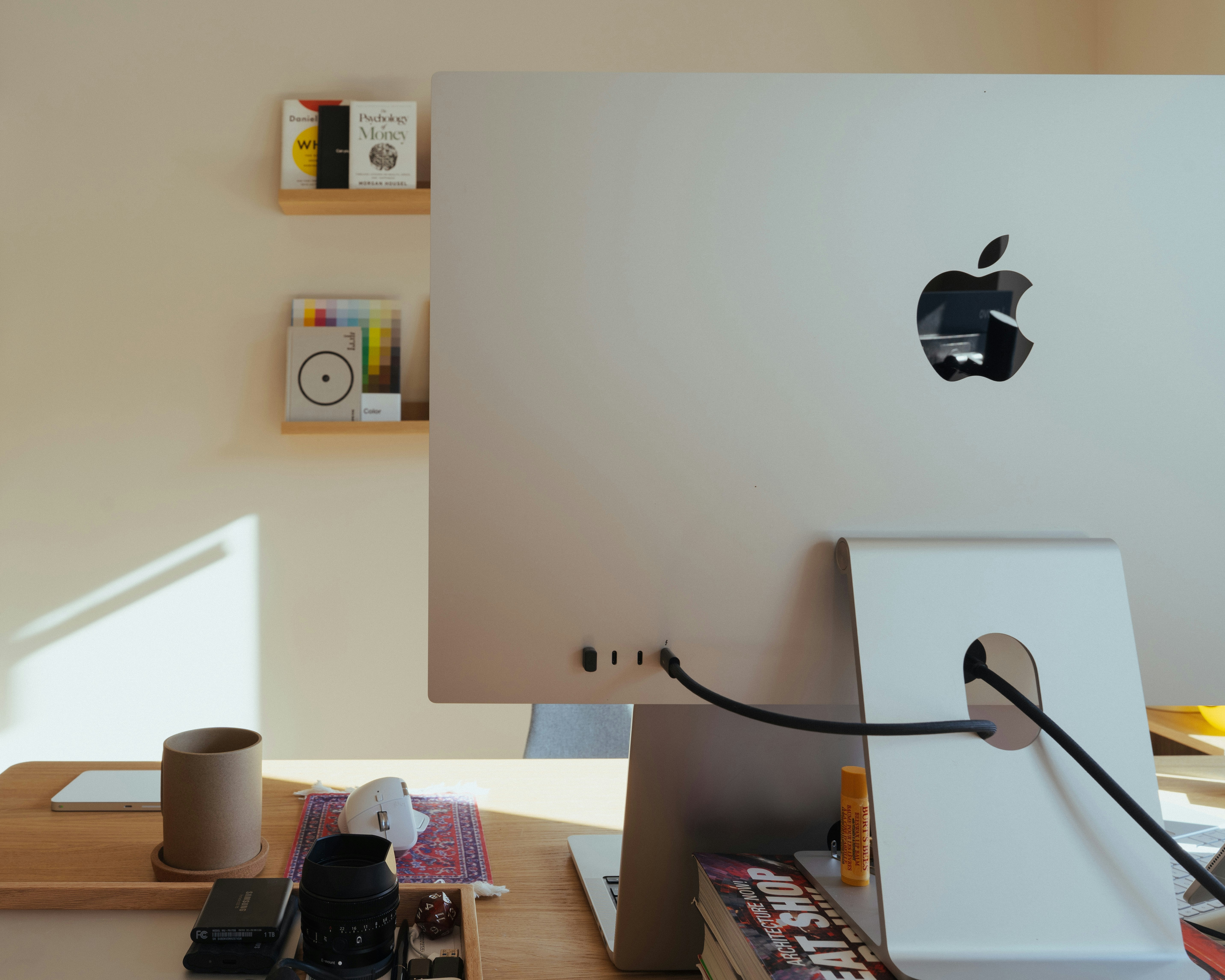 image of desk with computer abd mug Photo by Olivier Amyot on Unsplash